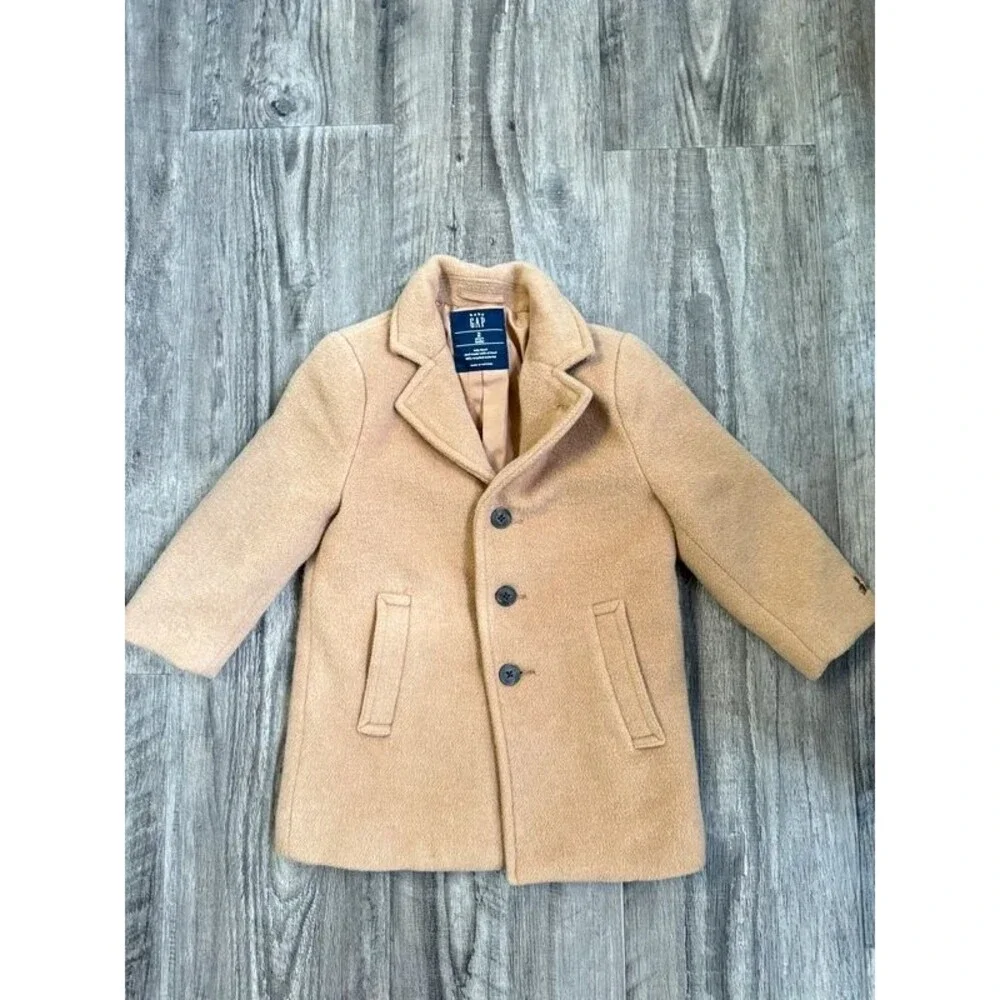 Camel color Gap Kids wool-blend coat features a notched collar button front. 2T